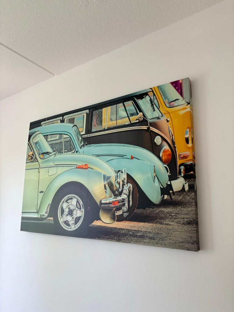 Groot schilderij met klassieke auto's en busje, Ophalen