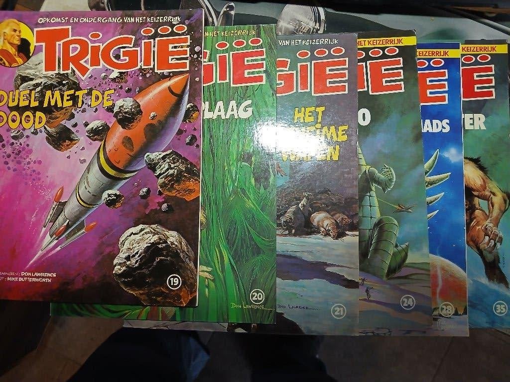 Trigië, Boeken, Stripboeken, Gelezen, Ophalen of Verzenden, Don Lawrence, Meerdere stripboeken