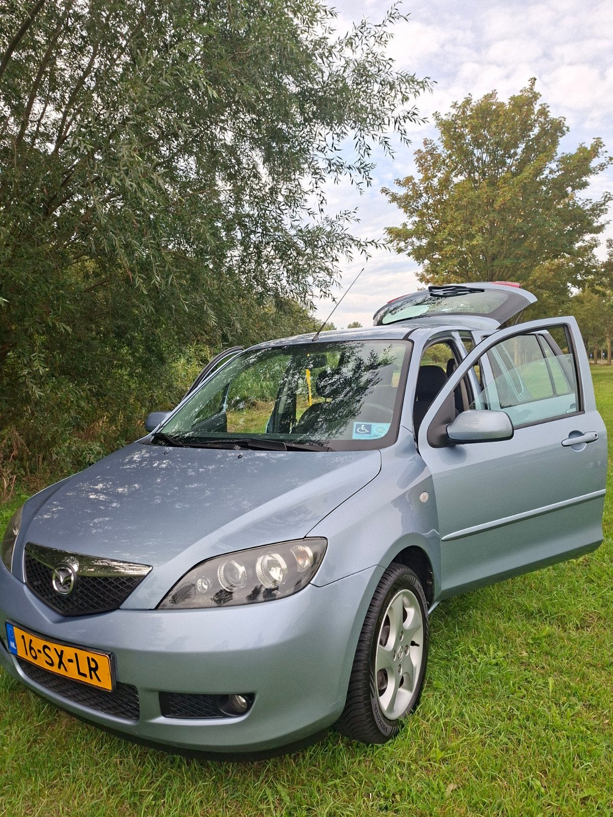 Mazda 2 1.4 16V AUT 2006 Blauw, Zwart, 4 cilinders, Blauw, Origineel Nederlands