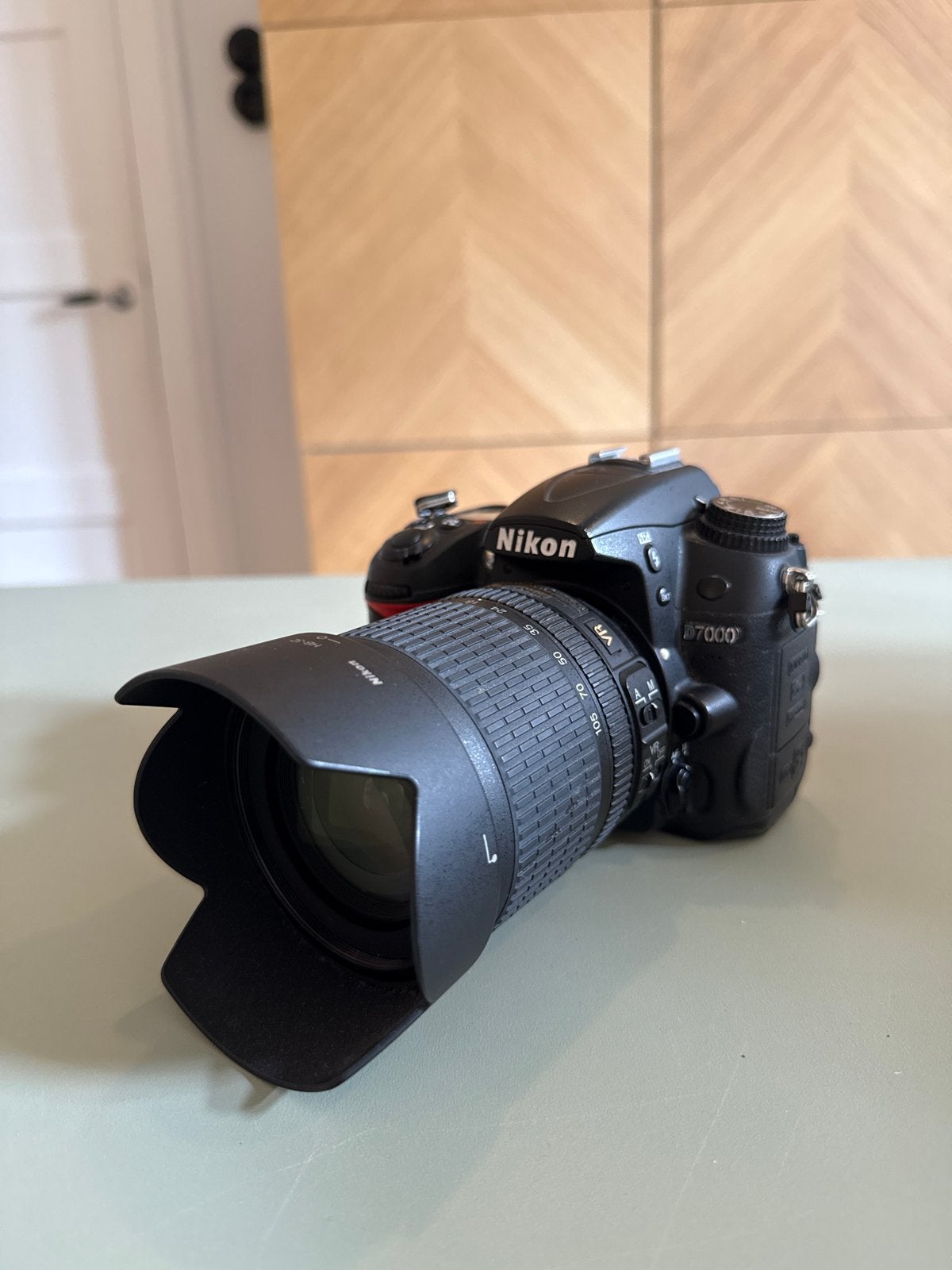 Nikon D7000 met Nikkor 18-105mm lens (zonder batterij), Gebruikt, Spiegelreflex, Ophalen of Verzenden, Lensdop