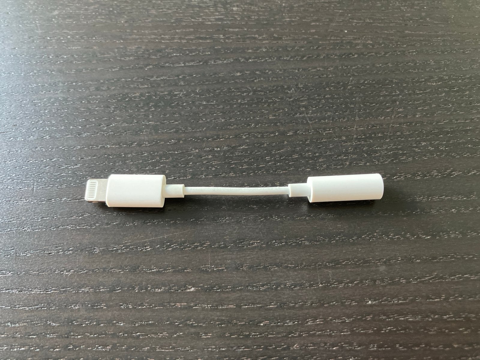 Originele Apple Lightning naar 3,5mm koptelefoonadapter, Ophalen of Verzenden, Zo goed als nieuw, Snoer of kabel, Apple