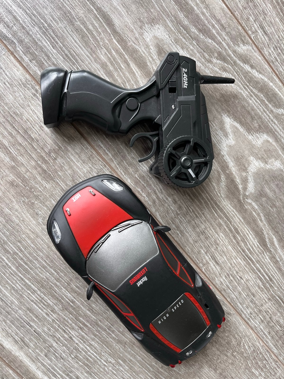 RC bestuurbare Auto met afstandsbediening - Zwart/Rood, Ophalen of Verzenden, Zo goed als nieuw, Afstandsbediening
