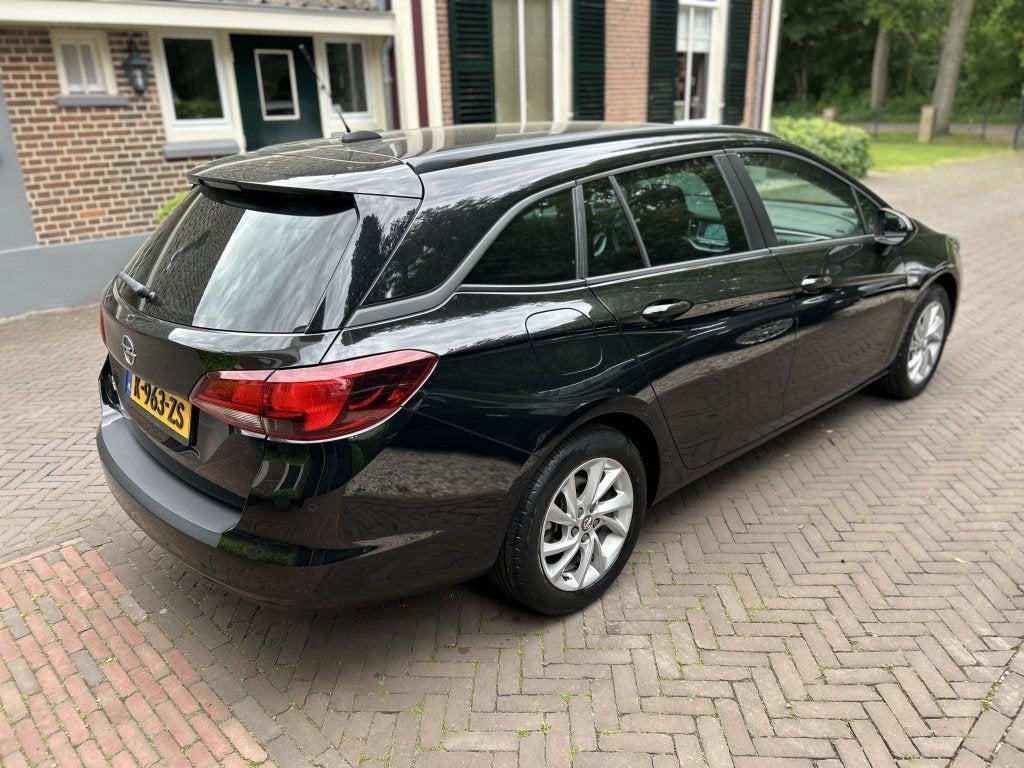 Opel Astra Sports Tourer 1.2 130pk Bns Ed. Navi, Camera, Car, Stof, Euro 6, 1199 cc, Met garantie (alle)
