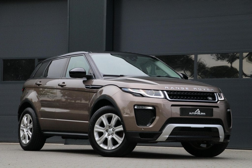 Land Rover Range Rover Evoque 2.0 Si4 HSE Dynamic 241PK Pano, Auto's, 4 cilinders, Bruin, Bedrijf, Vierwielaandrijving