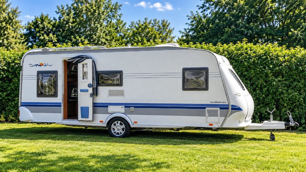 Hobby 560 KMFe Excellent 2006 | BOVAG gekeurd | Airco, Rondzit, Hobby, Particulier, 5 tot 6 meter