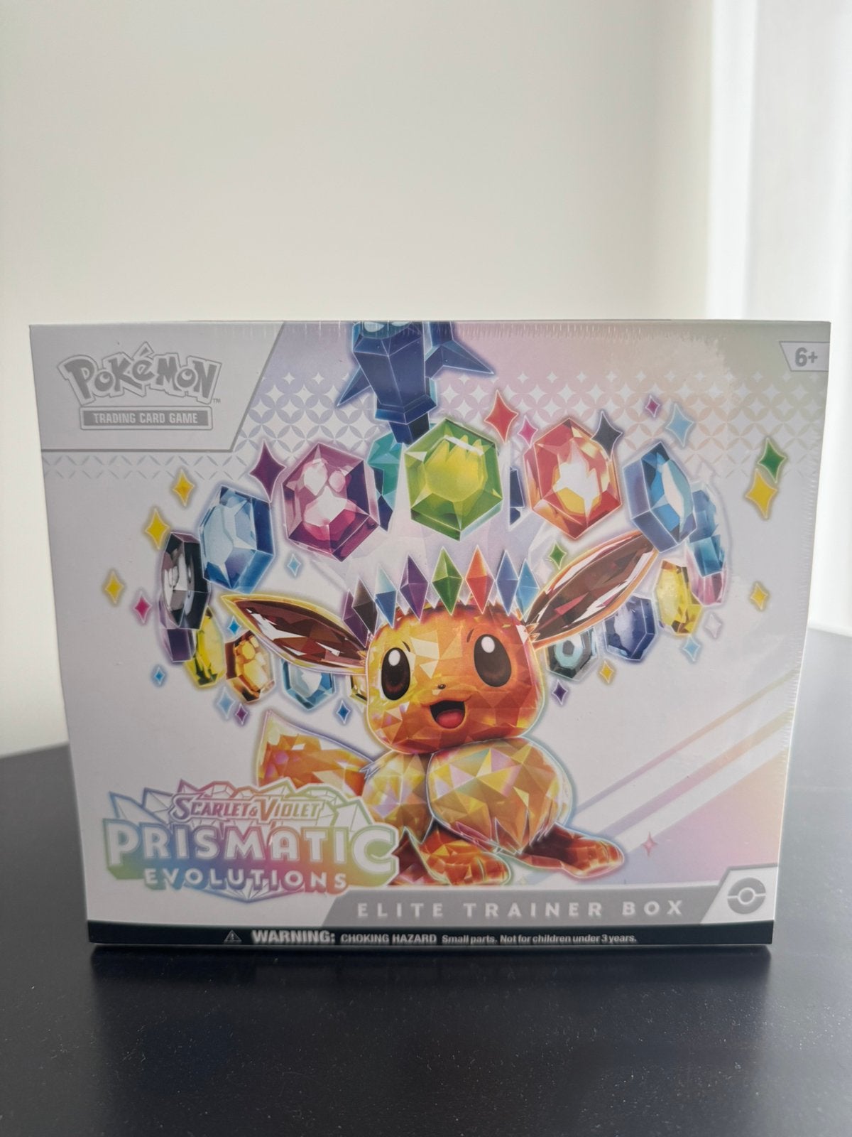 PRISMATIC EVOLUTIONS ELITE TRAINER BOX - ETB, Ophalen of Verzenden, Zo goed als nieuw, Boosterbox