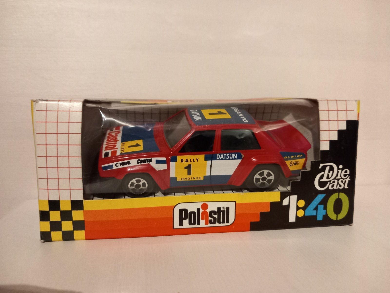 Polistil 1:40 Datsun Violet 160 j Rally rood 1982, Ophalen of Verzenden, Zo goed als nieuw, Auto, Overige merken