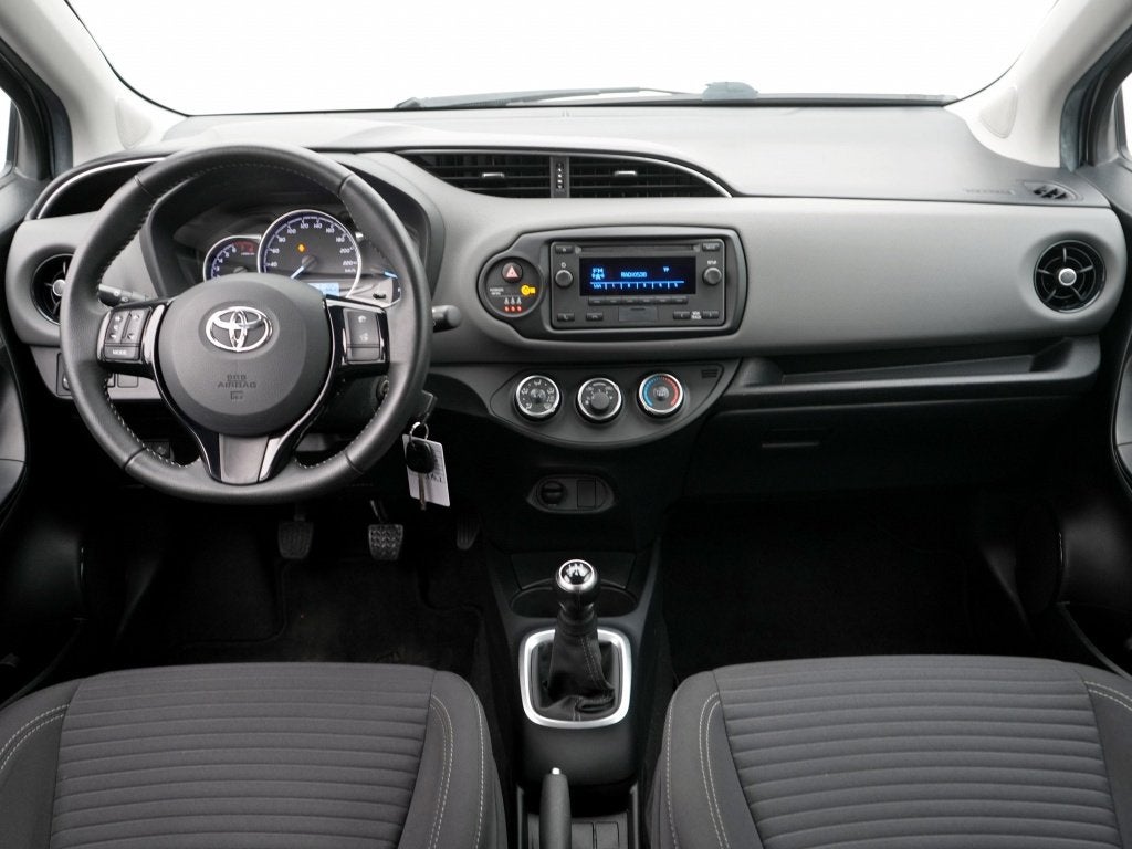 Toyota Yaris 1.0 VVT-i Comfort | Airco | Bluetooth | Dealer, 21 km/l, Stof, 730 kg, Bedrijf