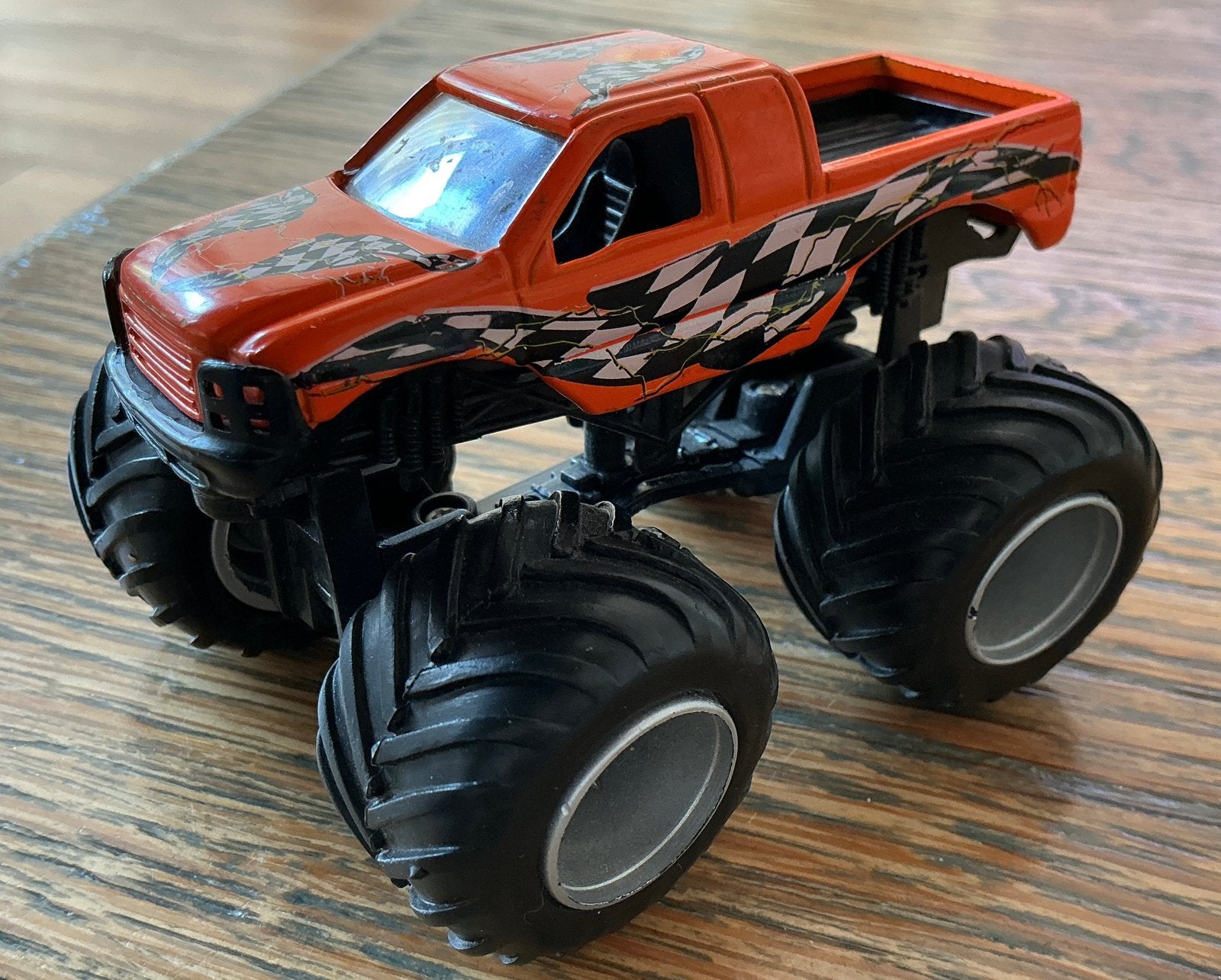 Monstertruck Prachtige Oranje auto zwart witte race blokjes, Ophalen, Gebruikt, Overige typen