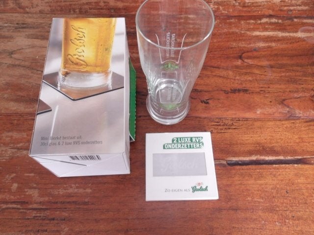 Grolsch glas (nr.2) met RVS onderzetters, Ophalen of Verzenden, Nieuw, Glas of Glazen, Grolsch