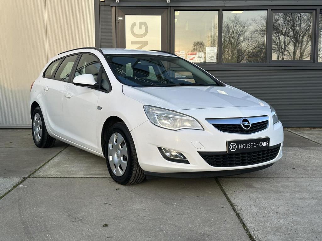 Opel Astra Sports Tourer 1.4 Edition Airco Cruise Navi NAP, Euro 5, Gebruikt, 4 cilinders, Wit