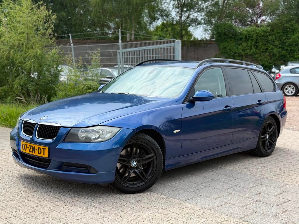 BMW 3-serie Touring 318i Business Line Airco Navi Cruise PDC, Achterwielaandrijving, Blauw, Origineel Nederlands, Handgeschakeld