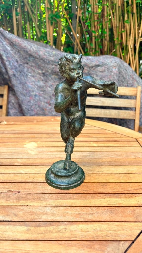 Bronze Pan statue, Ophalen, Brons
