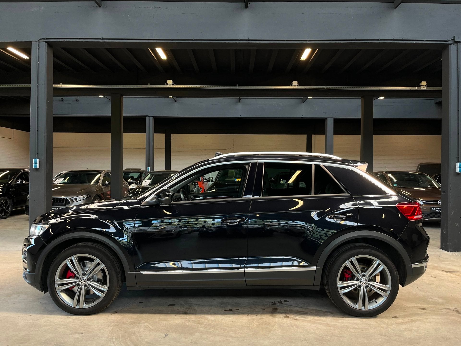 Volkswagen T-ROC 2.0 TSI 4Motion Sport Pano/Carplay/ACC/Stuu, Auto's, Automaat, Dealer onderhouden, 15 km/l, Gebruikt