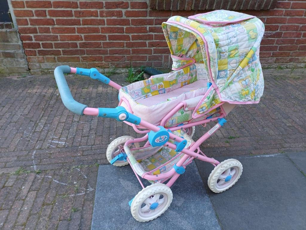 Roze poppenwagen met vrolijke print, Ophalen of Verzenden, Gebruikt, Kinderwagen, Overige merken