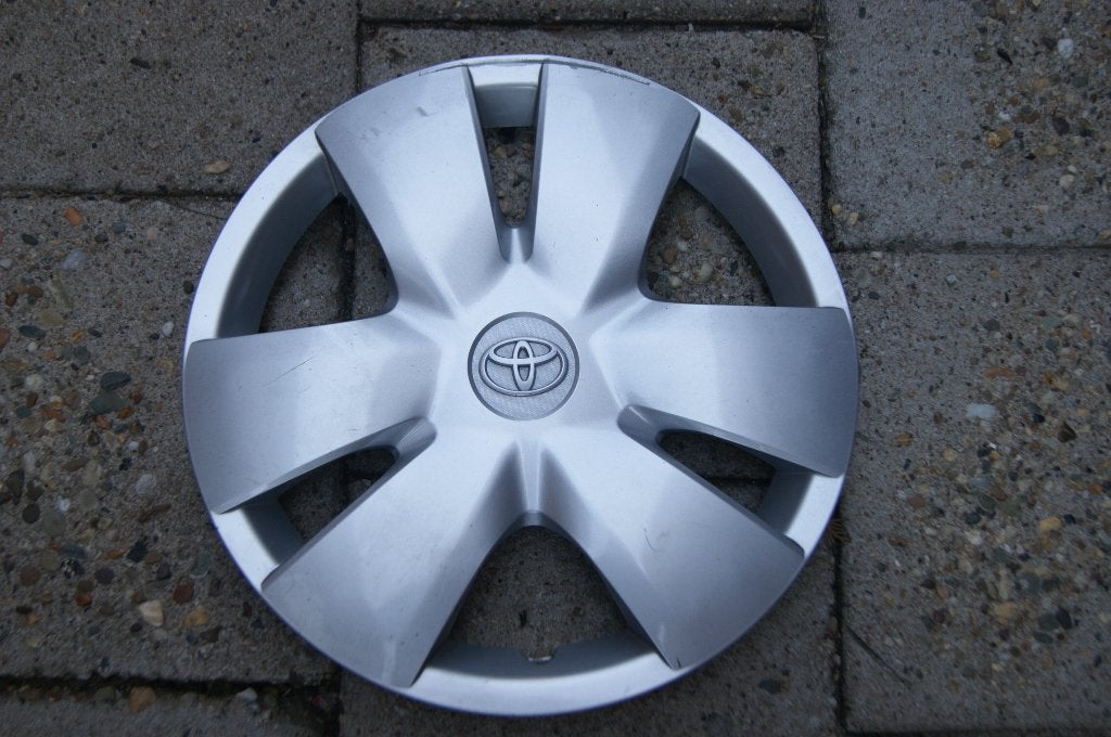 1 losse originele wieldop Toyota Yaris 14 inch (Model 3), Auto diversen, Wieldoppen, Ophalen of Verzenden, Gebruikt