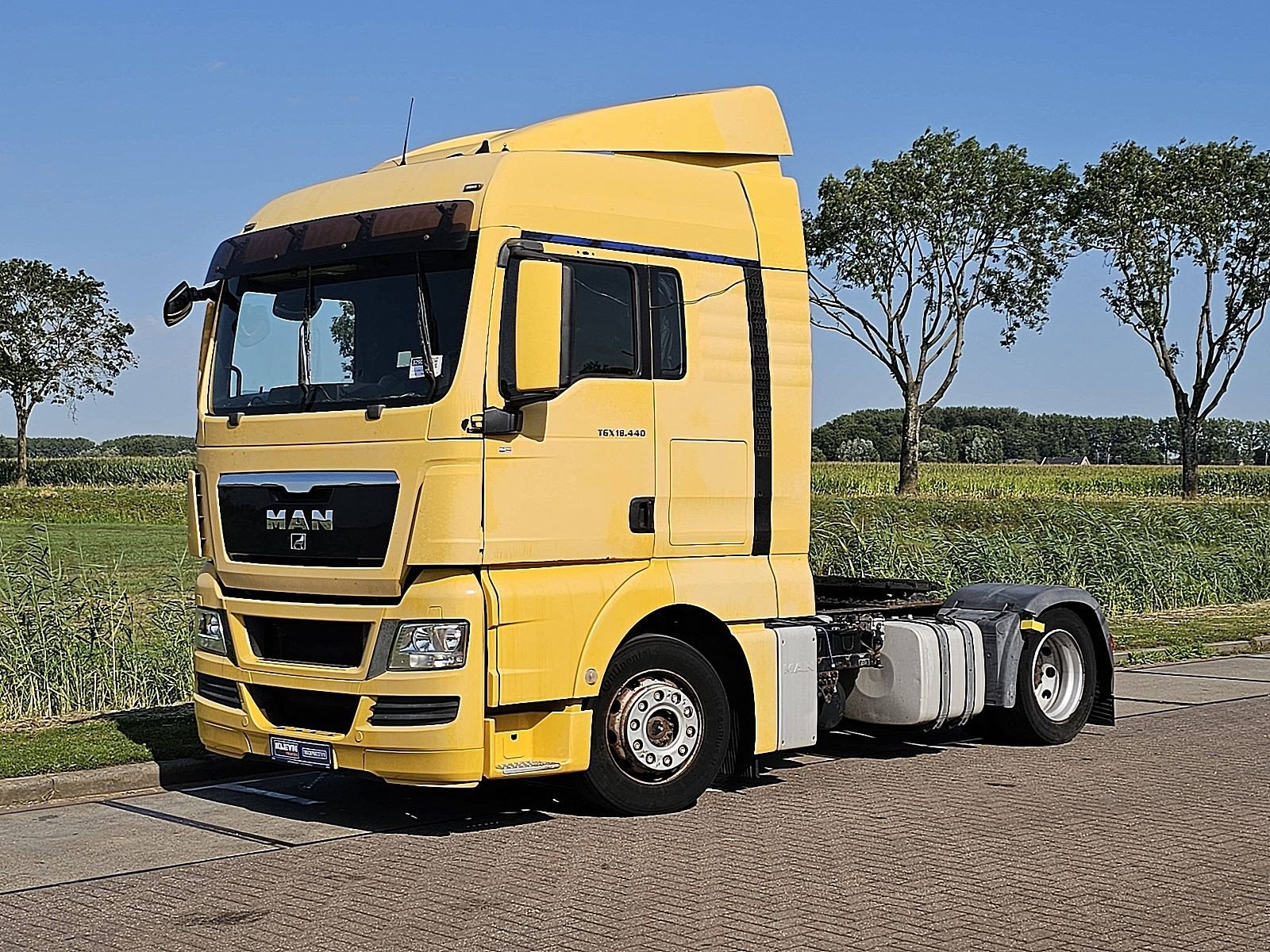 M.A.N. 18.440 TGX, Auto's, Euro 5, MAN, Geel, Bedrijf
