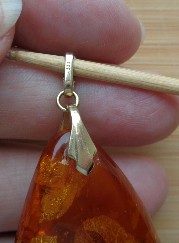 grote barnsteen hanger met 8 krt gouden oog [245], Verzenden, Zo goed als nieuw, Met edelsteen, Goud