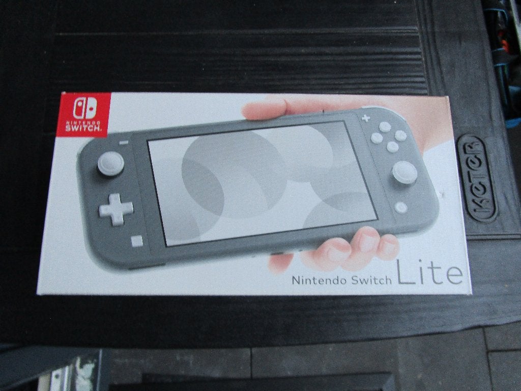 Nintendo switch lite met 12 spellen, Spelcomputers en Games, Spelcomputers | Nintendo Switch Lite, Ophalen, Grijs, Zo goed als nieuw
