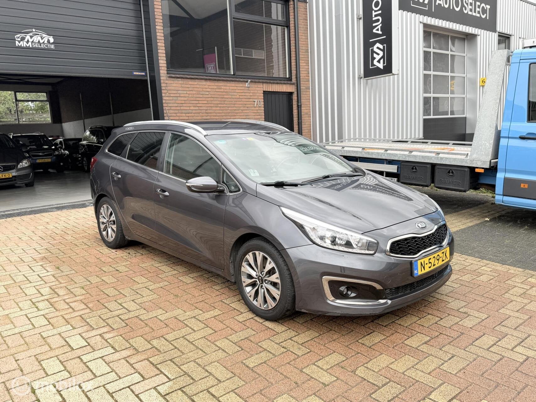 Kia Cee'd Sportswagon 1.0 T-GDi FirstEdition Camera Trekhaak, Auto's, Voorwielaandrijving, Gebruikt, Euro 6, Handgeschakeld