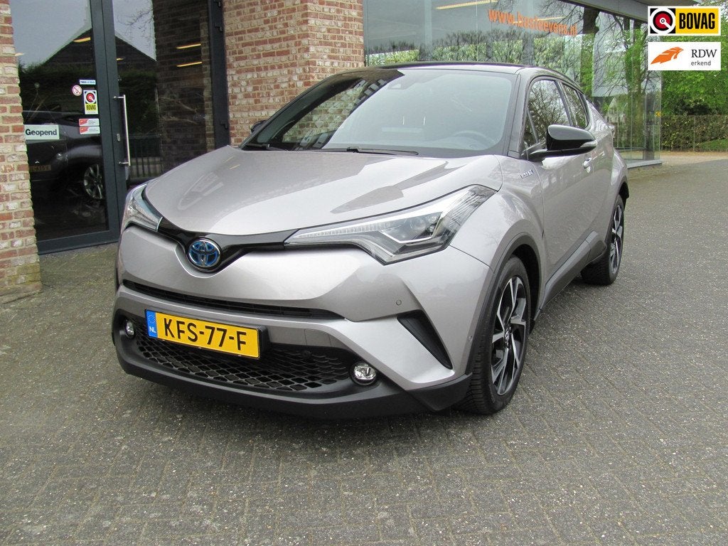 Toyota C-HR 1.8 Hybrid Executive Automaat Navi Achteruitrijc, Auto's, Toyota, Stof, 4 cilinders, Automatische klimaatregeling