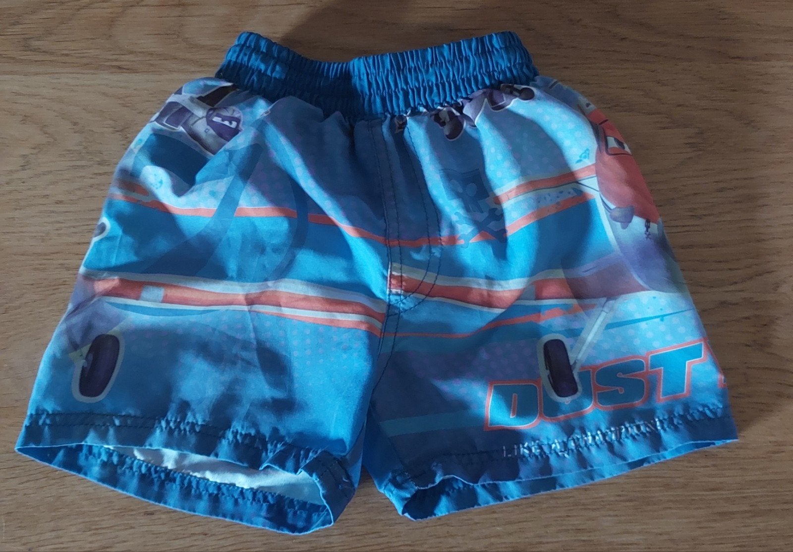 Stoere zwembroek Dusty Planes, maat 104/110, Ophalen, Sport- of Zwemkleding, Zo goed als nieuw, Jongen