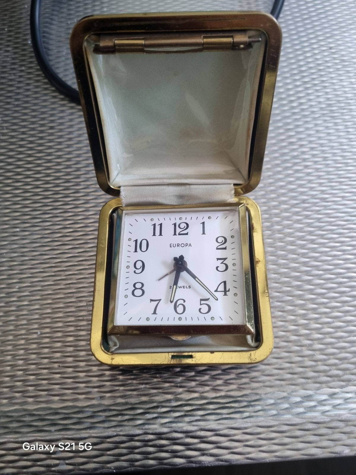 Vintage Europa reiswekker in lederen etui, Antiek en Kunst, Antiek | Klokken, Ophalen of Verzenden