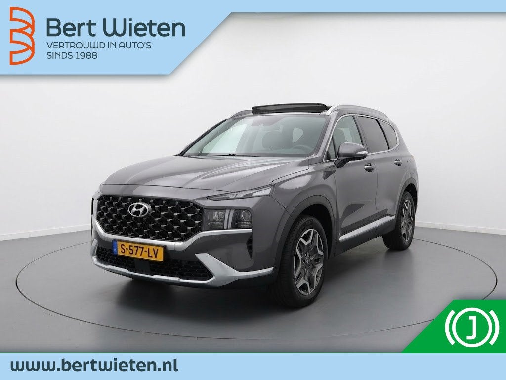 Hyundai Santa Fe 1.6 T-GDI HEV Premium Plus Sky 7p. | Geen i, Auto's, Dealer onderhouden, Santa Fe, Gebruikt, 4 cilinders