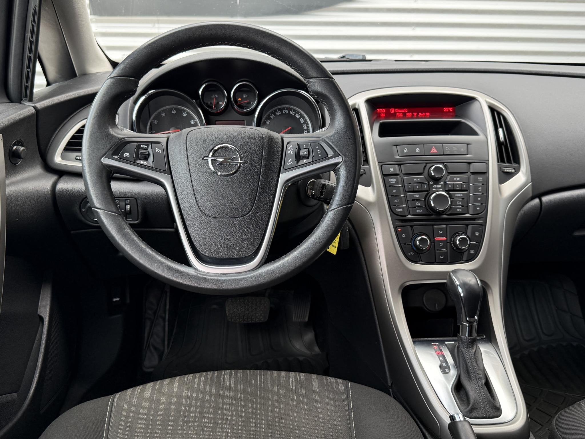 Opel Astra 1.4 Turbo Edition 2e Eigenaar|Trekhaak|Airco|Crui, Auto's, Euro 5, Gebruikt, 4 cilinders, 1353 kg
