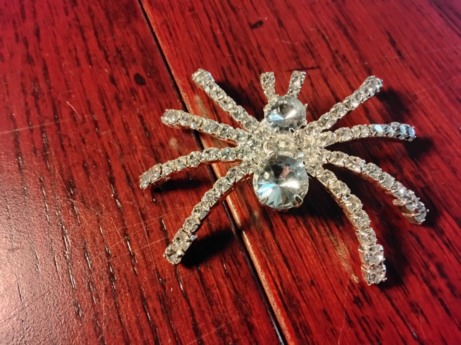 Strass spin broche, Ophalen of Verzenden, Zo goed als nieuw, Zilver, Overige materialen