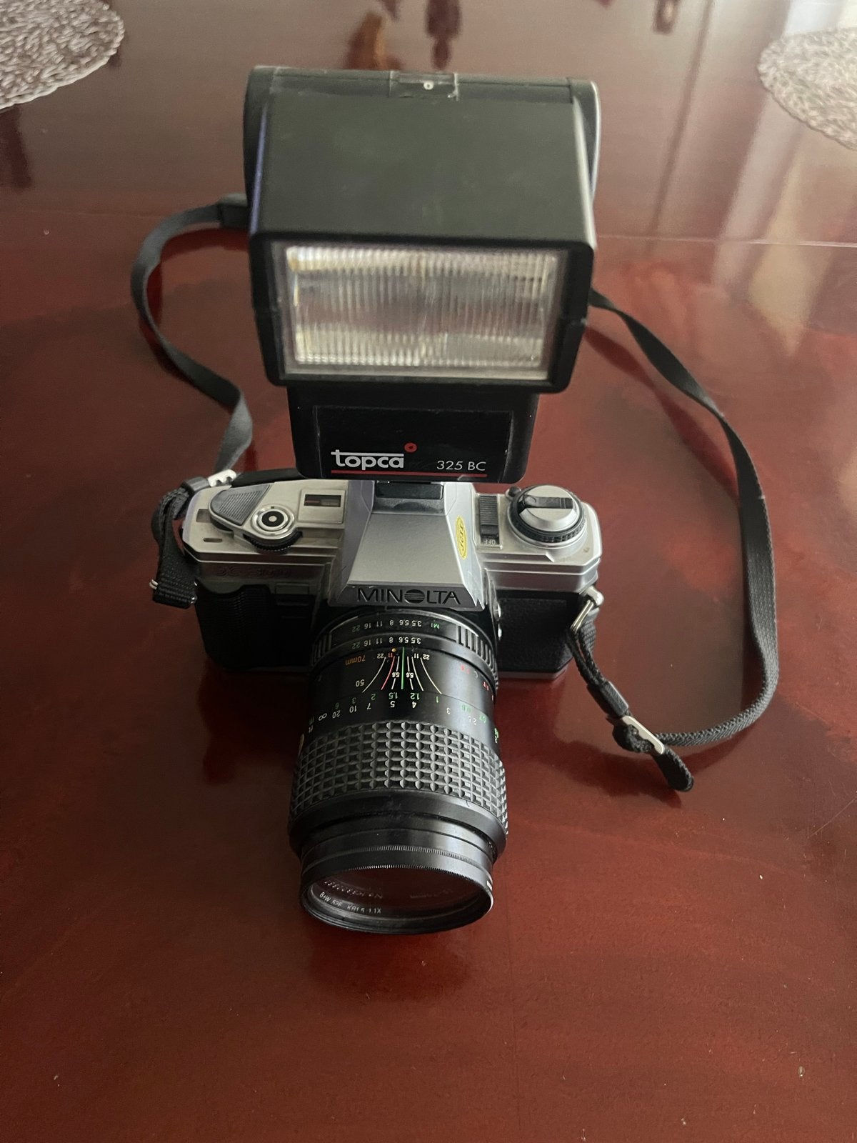 Minolta X-300 Spiegelreflexcamera met Topca 325 BC flitser, Audio, Tv en Foto, Fotocamera's Analoog, Ophalen of Verzenden, Gebruikt