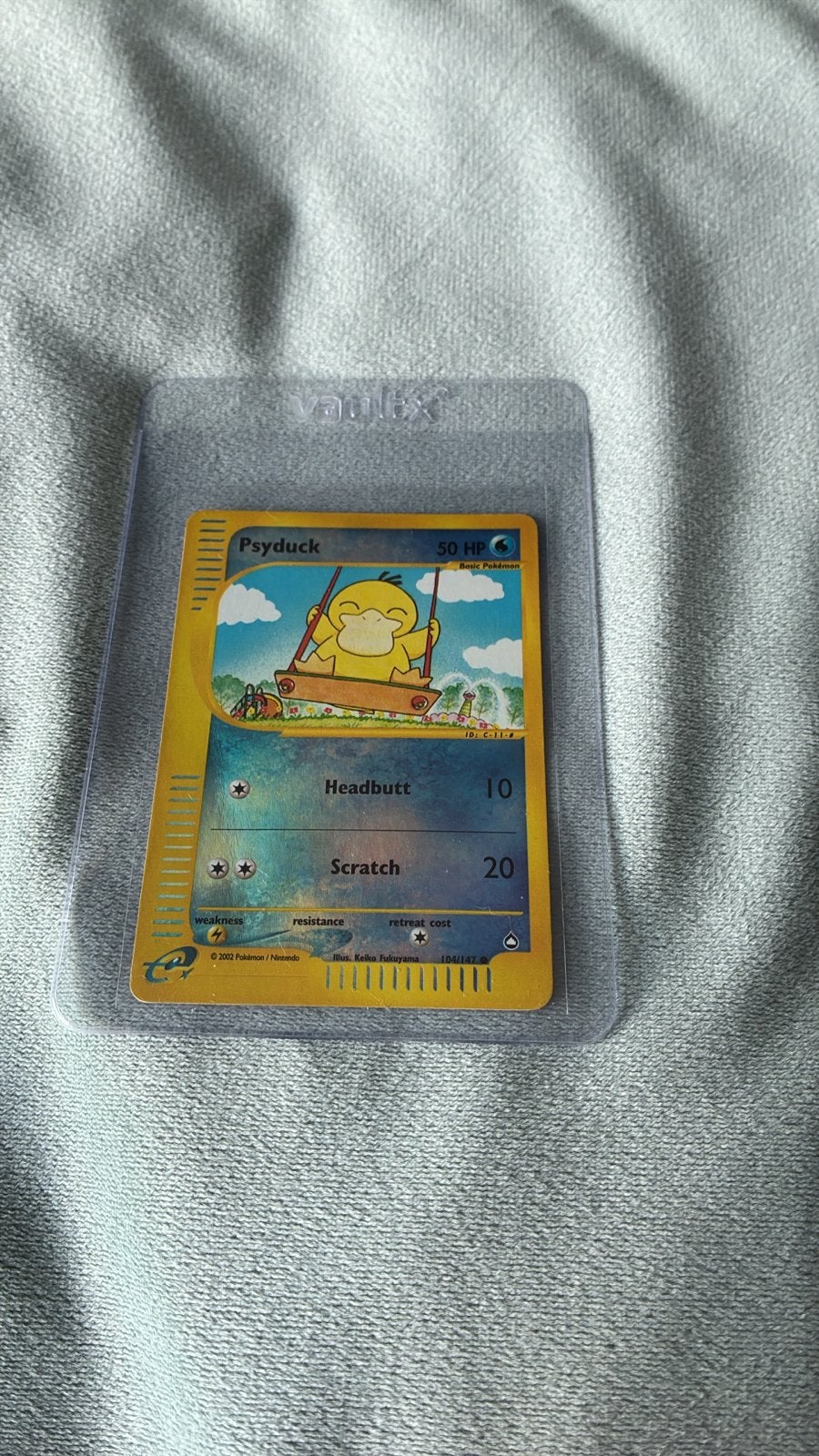 Psyduck Pokémon Kaart 104/147 -  aquapolis (2003), Hobby en Vrije tijd, Verzamelkaartspellen | Pokémon, Ophalen of Verzenden, Gebruikt