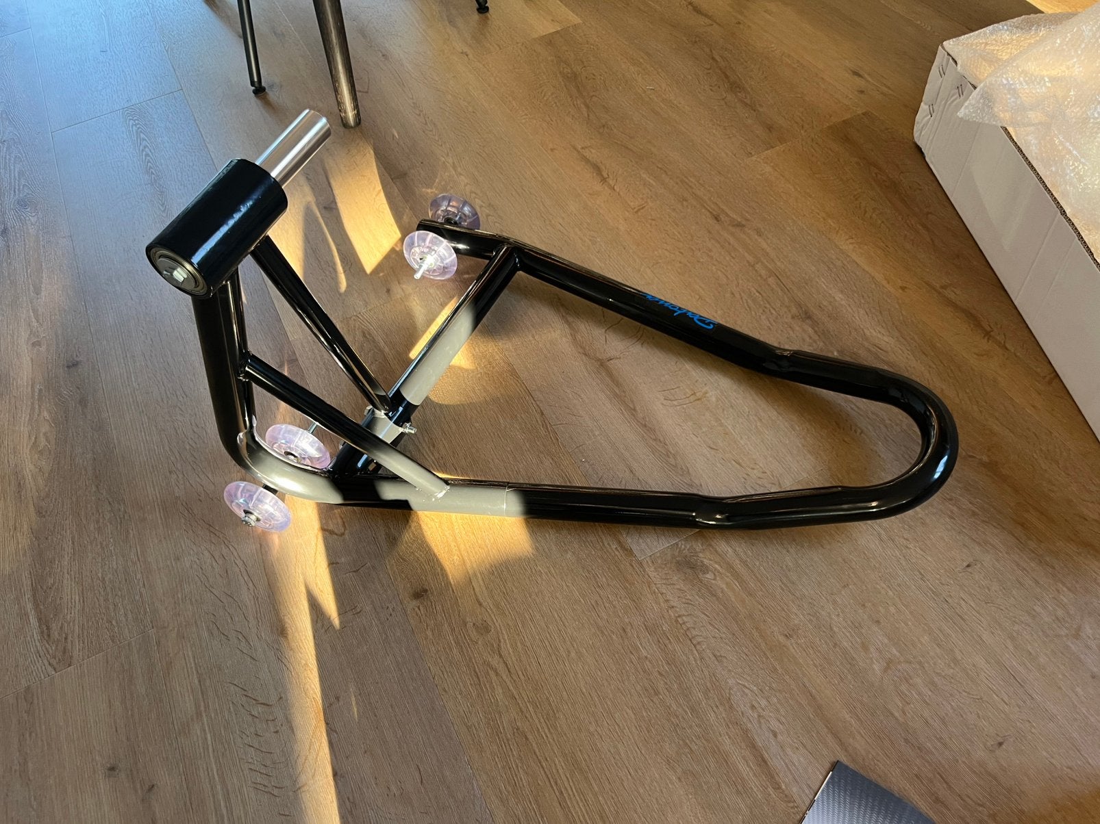 paddockstand enkelzijdige ophanging, Motoren, Ophalen