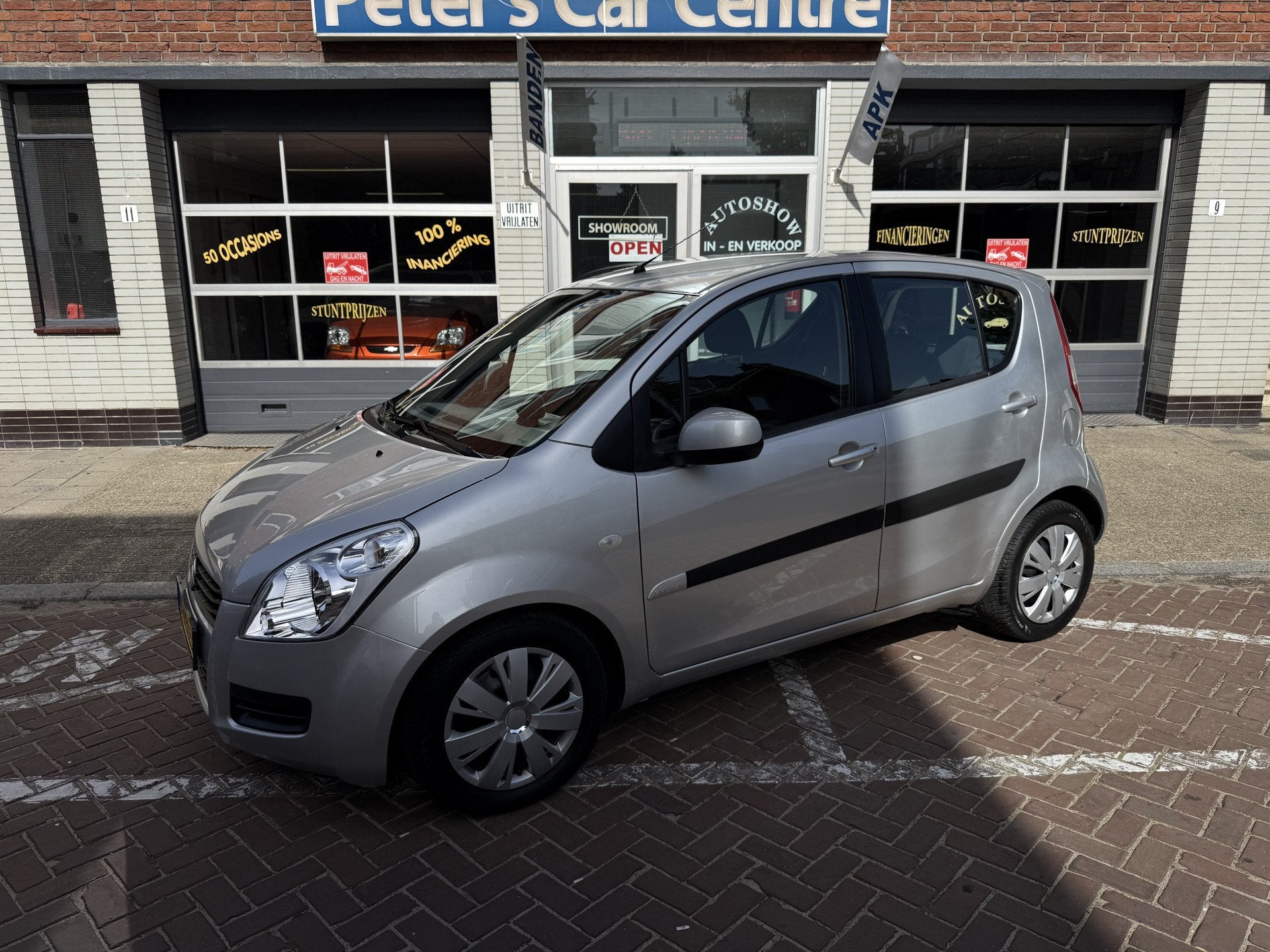 Suzuki Splash 1.2 Comfort (bj 2011, automaat), Auto's, Stof, 4 cilinders, Origineel Nederlands, Bedrijf