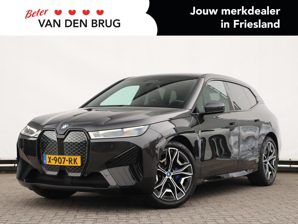BMW iX xDrive40 Business Edition Plus 77 kWh | 360 camera, Automaat, Stof, Gebruikt, 495 min