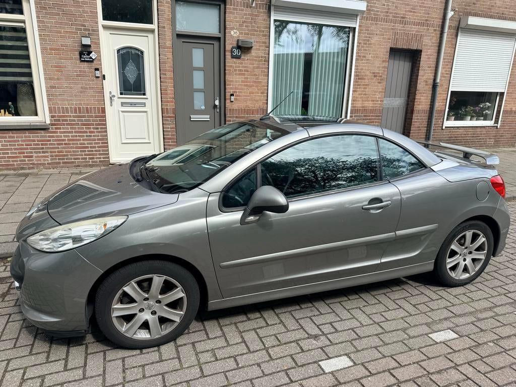 Peugeot 207CC 1.6 16V Roland Garros., Auto's, Peugeot, Particulier, Benzine, D, Cabriolet, Handgeschakeld, Geïmporteerd, Zilver of Grijs