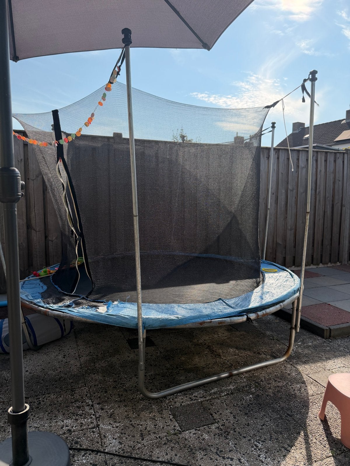 Gebruikte trampoline met veiligheidsnet, Ophalen