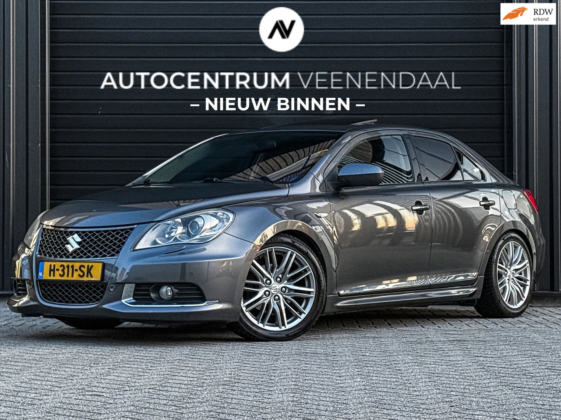 Suzuki Kizashi 2.4 Sport 178 PK AUT 4WD FULL OPTIONS UNIEK!, Auto's, Suzuki, Euro 5, Gebruikt, Zwart, 4 cilinders