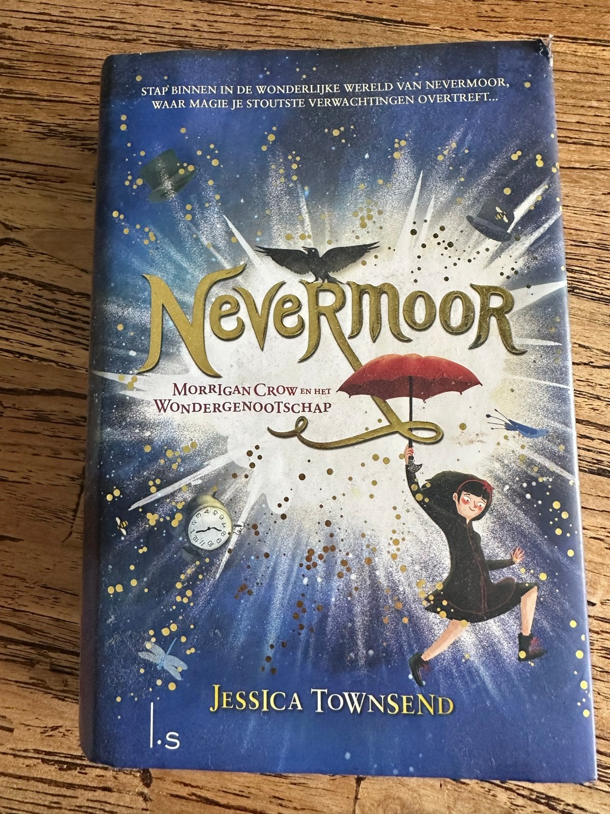 Boek Nevermoor: Morrigan Crow en het Wondergenootschap, Boeken, Ophalen of Verzenden, Gelezen, Fictie algemeen