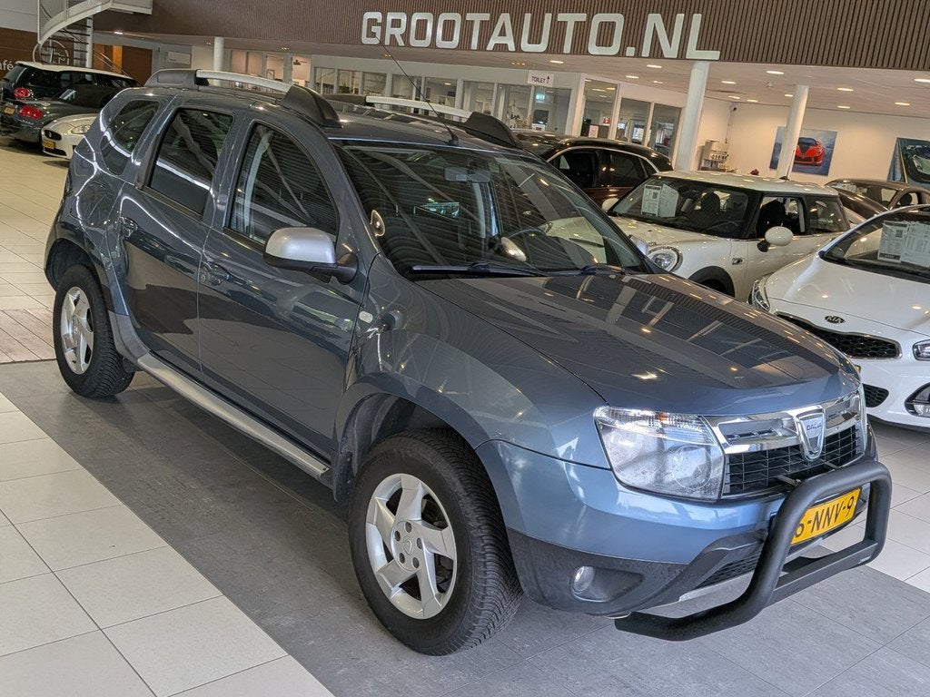 Dacia Duster 1.6 Lauréate Airco, Stuurbekrachtiging, Auto's, Dacia, 13 km/l, Euro 5, Stof, Gebruikt