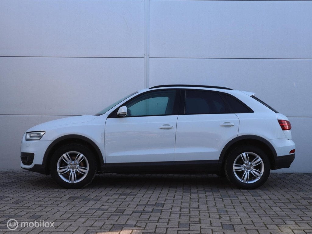 Audi Q3 2.0 TFSI quattro Clima Cruise Xenon PDC LED Navi, Auto's, Euro 5, 4 cilinders, 1984 cc, Wit