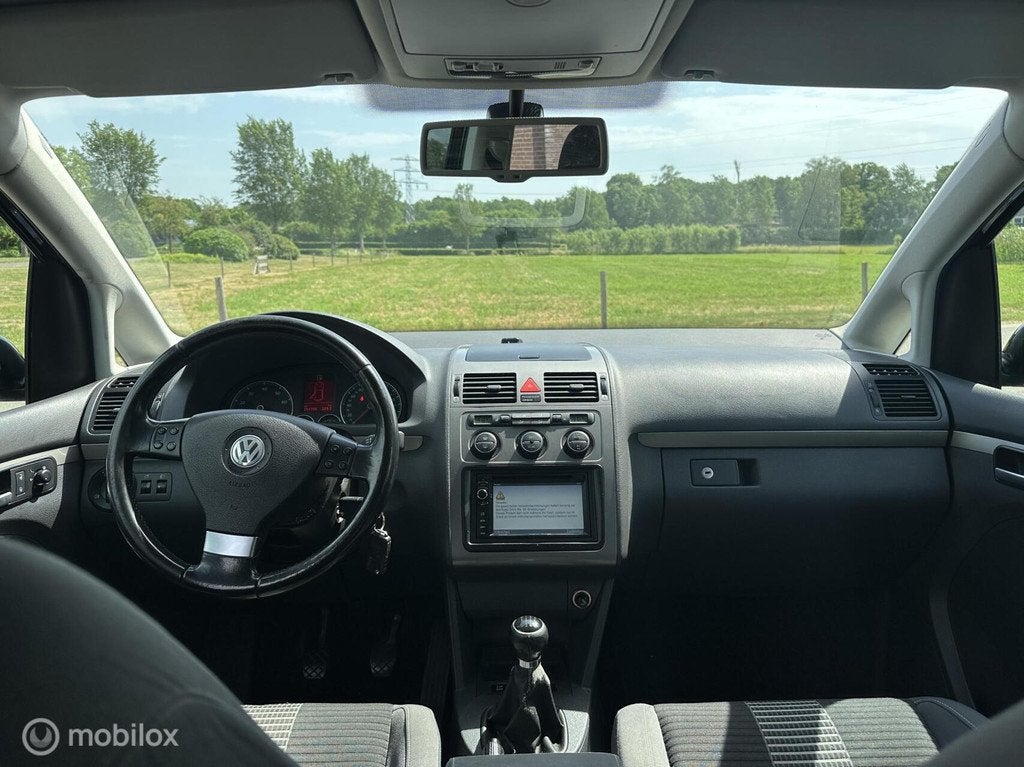 Volkswagen Touran 1.6 2009 7-personen Airco Navi Cruise✅, Auto's, Voorwielaandrijving, Euro 5, Stof, Gebruikt