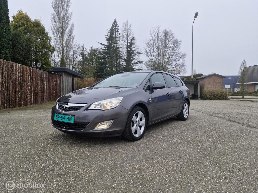 Opel Astra Sports Tourer 1.4 Turbo Sport, Auto's, Voorwielaandrijving, Euro 5, Gebruikt, 4 cilinders