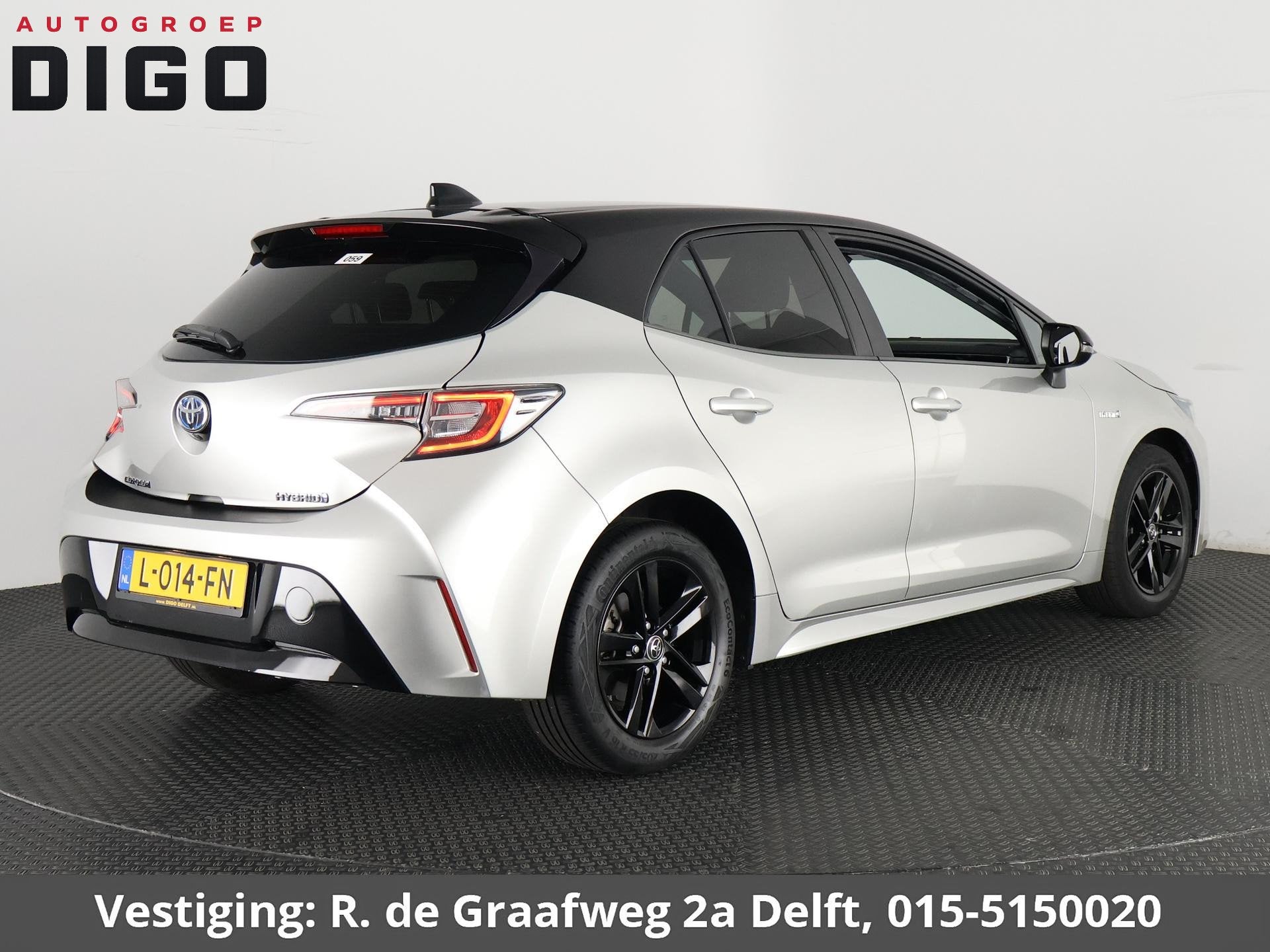 Toyota Corolla 1.8 Hybrid Active Bi-Tone Sport | Apple Carpl, Gebruikt, 4 cilinders, Corolla, 122 pk