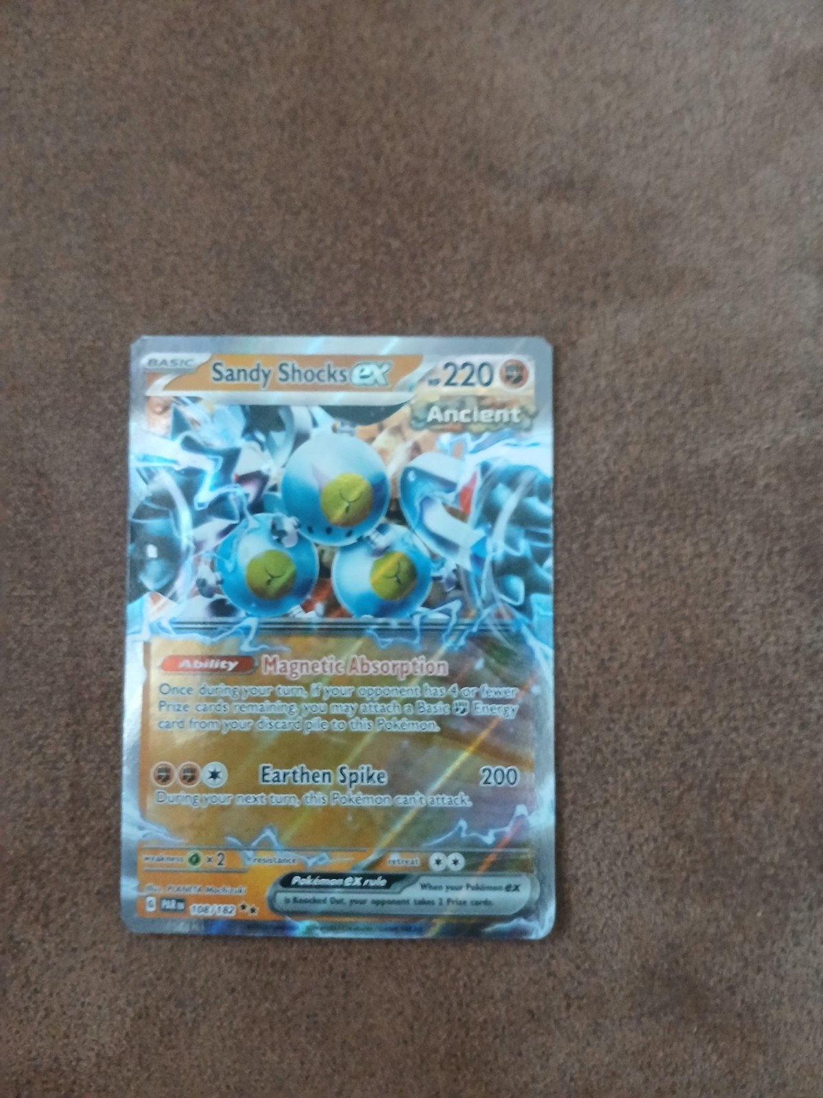 Pokémon TCG Sandy Shocks ex 220 Ancient EX kaart, Ophalen of Verzenden, Zo goed als nieuw, Losse kaart
