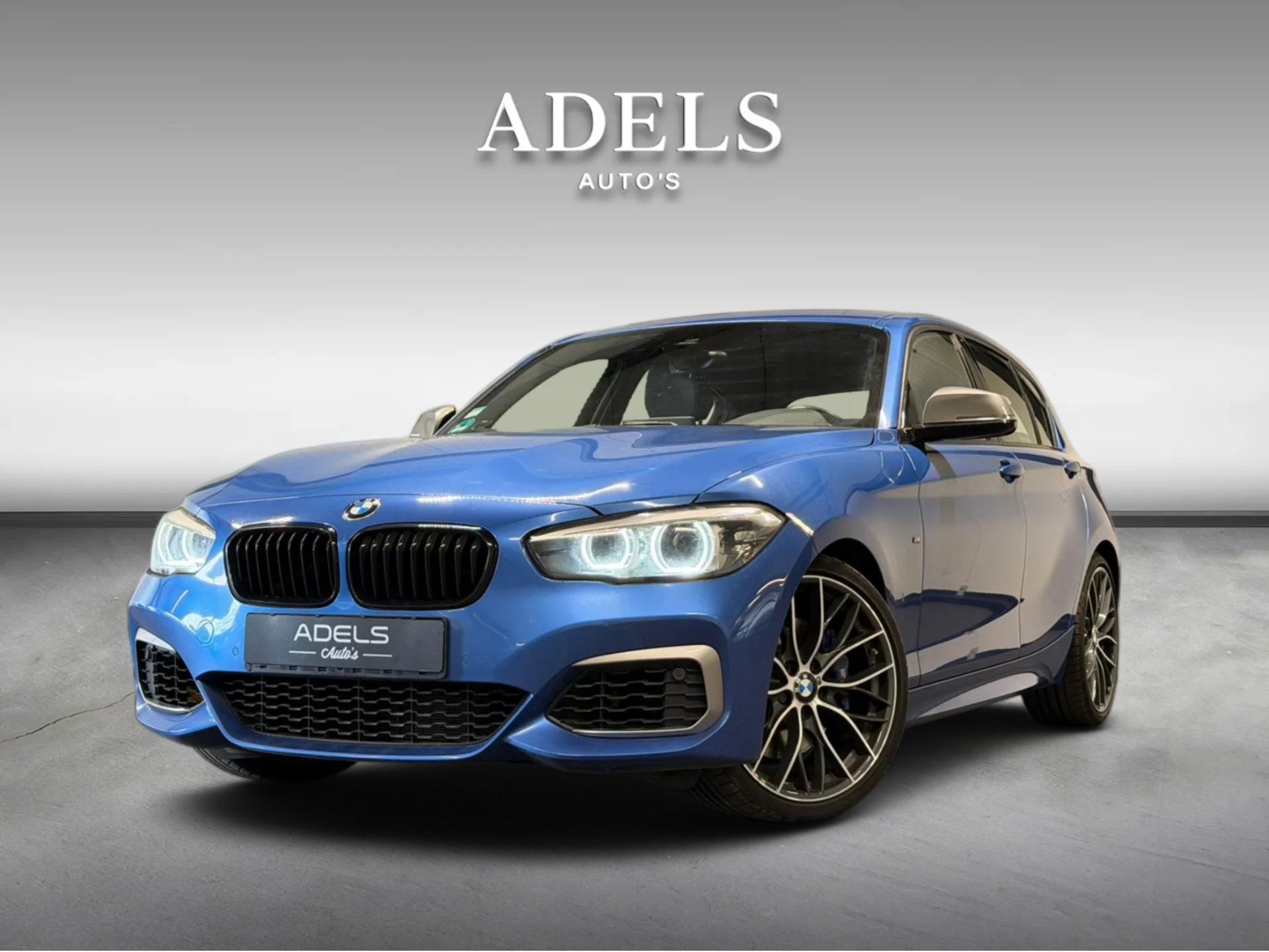 BMW 1-serie M140i Special Edition Estoril Blauw Dealer Onder, Auto's, BMW, Dealer onderhouden, Achterwielaandrijving, Gebruikt