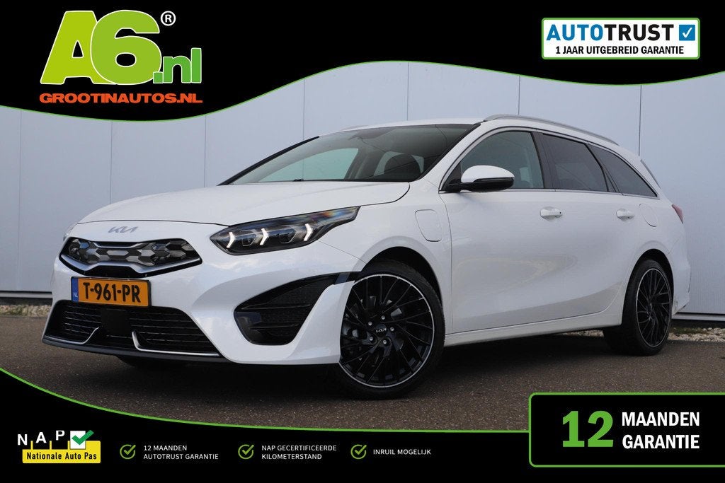 Kia Ceed Sportswagon 1.6 GDI PHEV DynamicPlusLine 18 inch LM, Gebruikt, Met garantie (alle), Leder en Stof, Wit