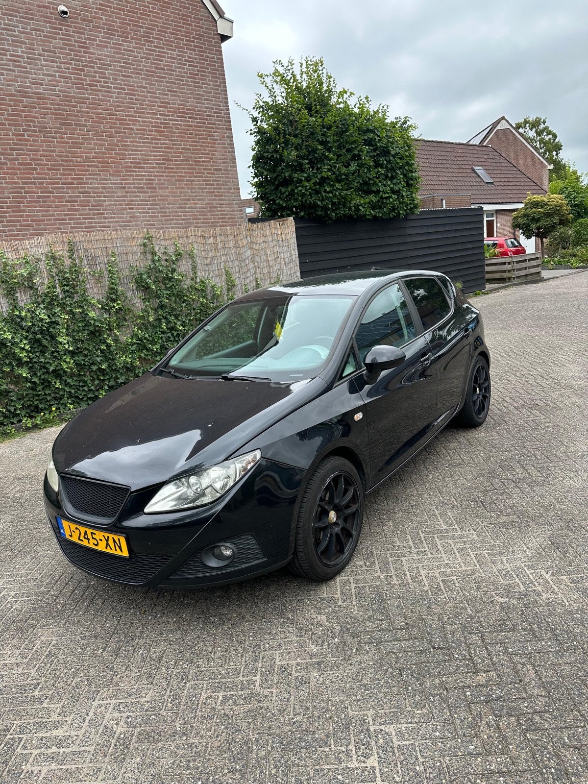 Seat Ibiza 1.4 63KW 5DRS 2010 Zwart, Voorwielaandrijving, 40 €/maand, 4 cilinders, Handgeschakeld