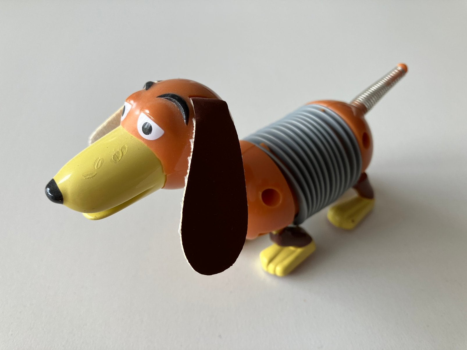 Slinky Dog - Walt Disney Pixar Toy Story nieuwstaat, Verzenden, Overige figuren, Zo goed als nieuw