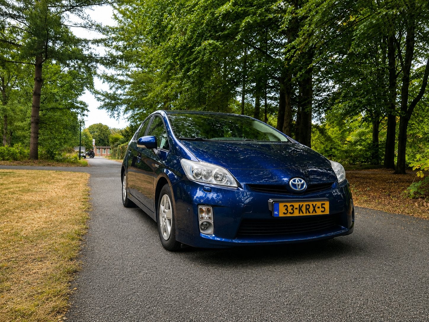 Toyota Prius 1.8 Executive | Leder | HUD | Adaptive Cruise, 1345 kg, 4 cilinders, Blauw, Prius